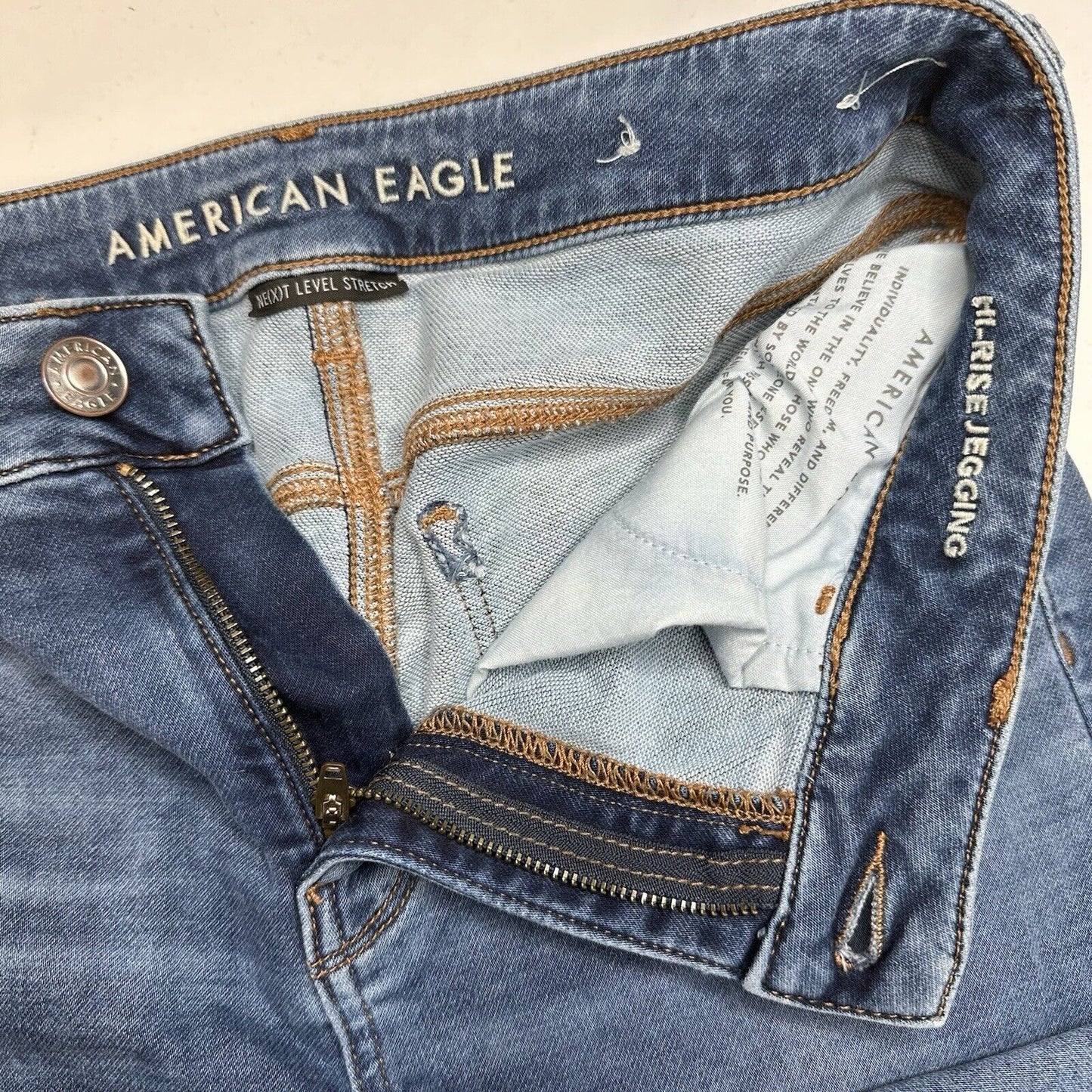 American Eagle Jeans 10 Hi Rise Jegging Next Level Stretch Blue Distress Grunge