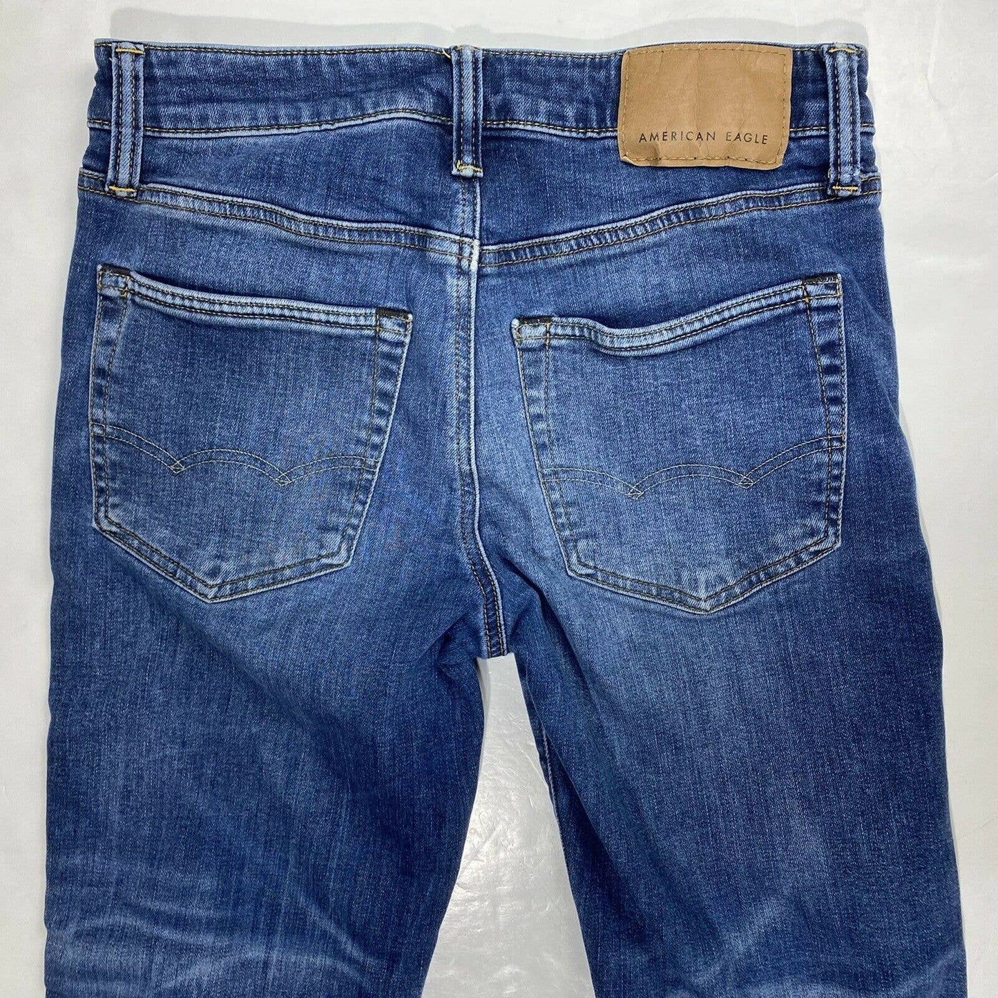 American Eagle Original Bootcut Sz 28 Cozy Airflex+ Denim Blue Jeans Holes *Flaw