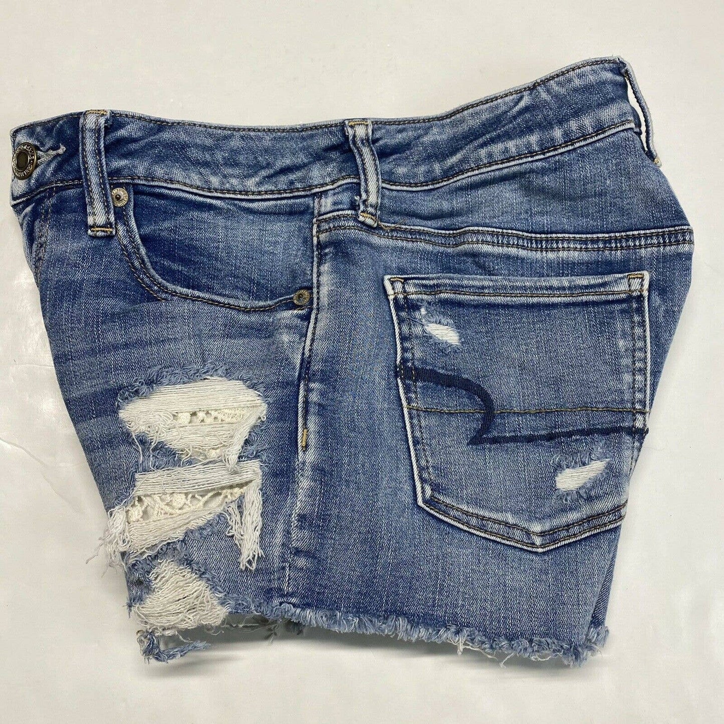 American Eagle Hi-Rise Shortie Sz 6 Next Level Stretch Denim Short Hole Fray EUC