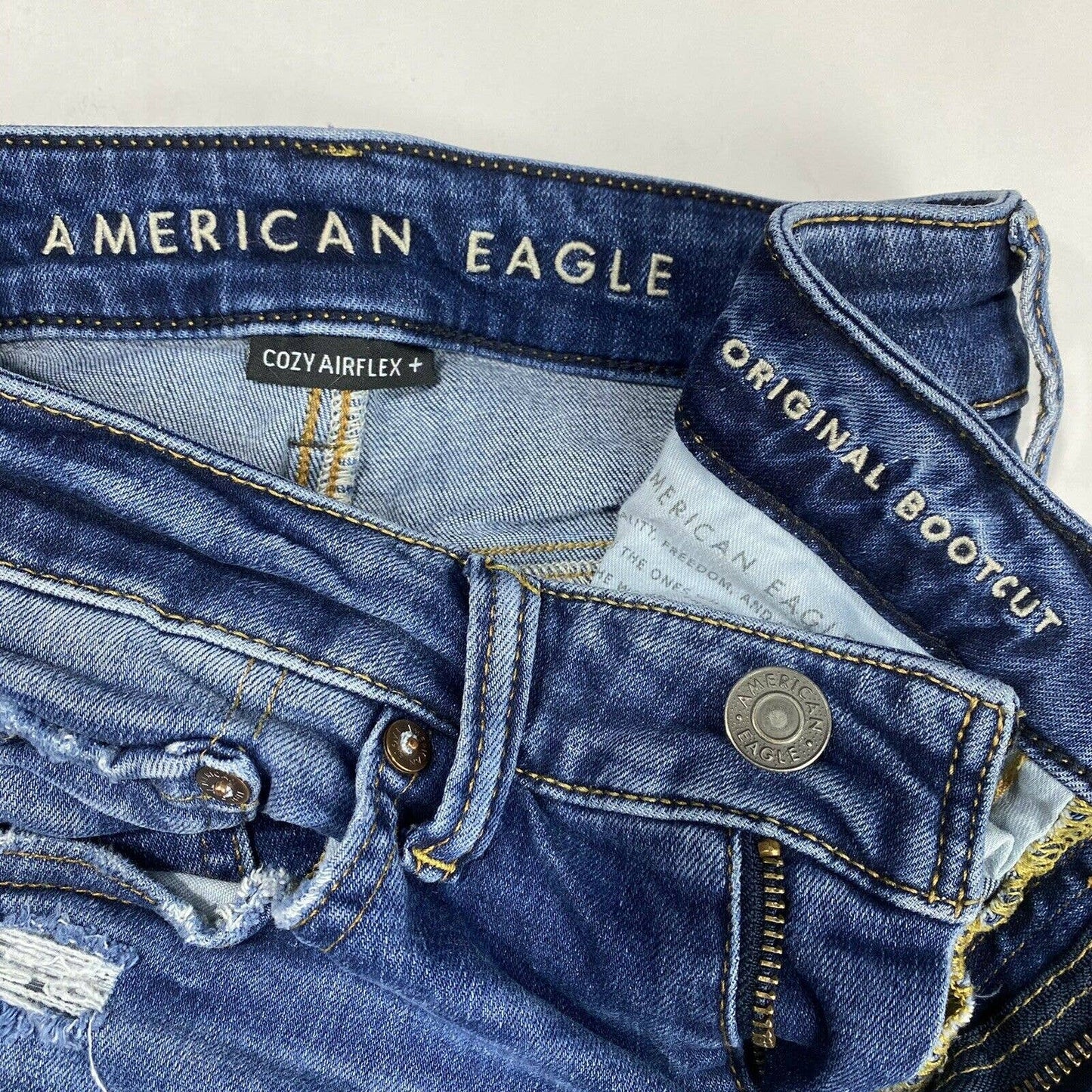 American Eagle Original Bootcut Sz 28 Cozy Airflex+ Denim Blue Jeans Holes *Flaw