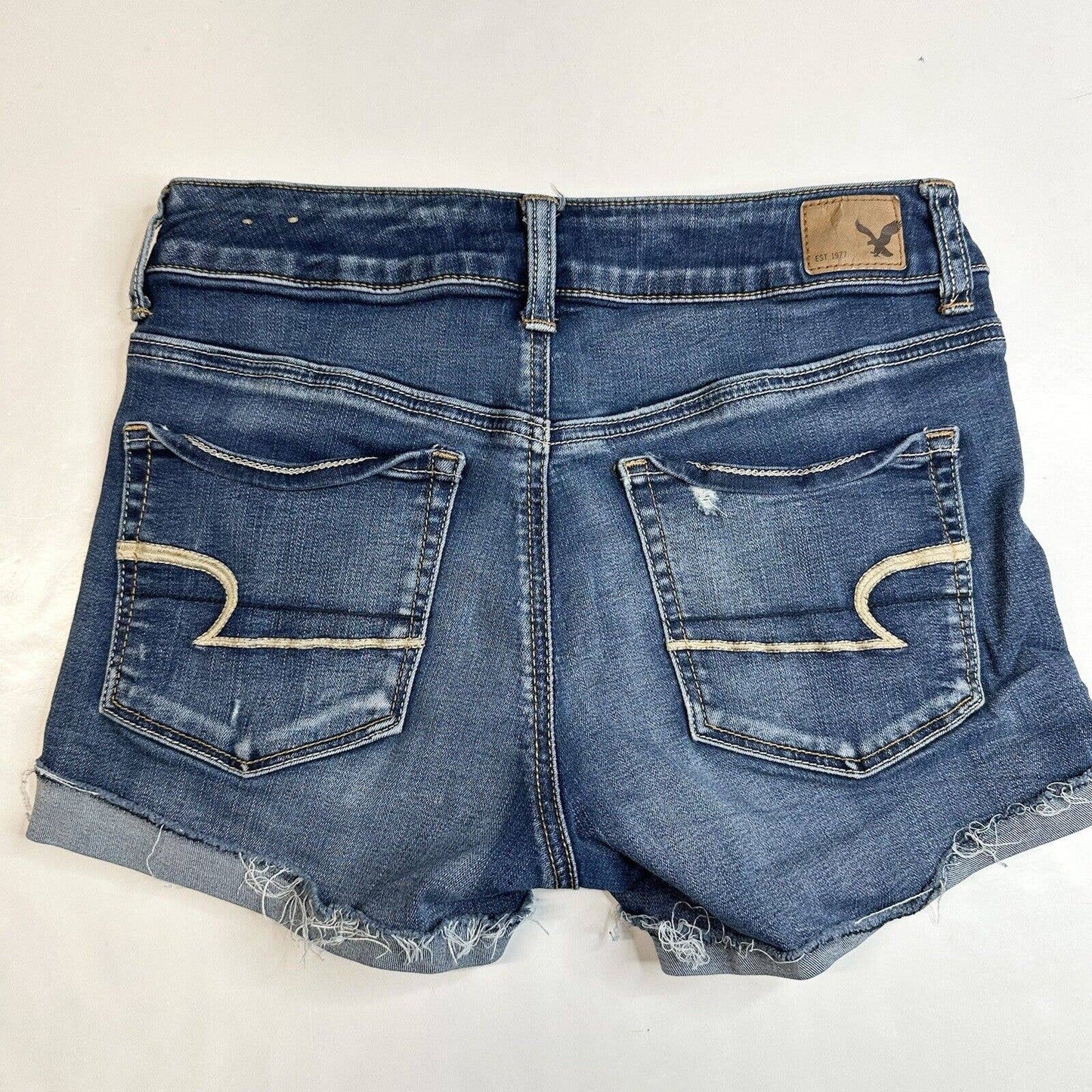 American Eagle Shortie 6 Super Stretch Denim Blue Jean Cuffed Shorts Distressed