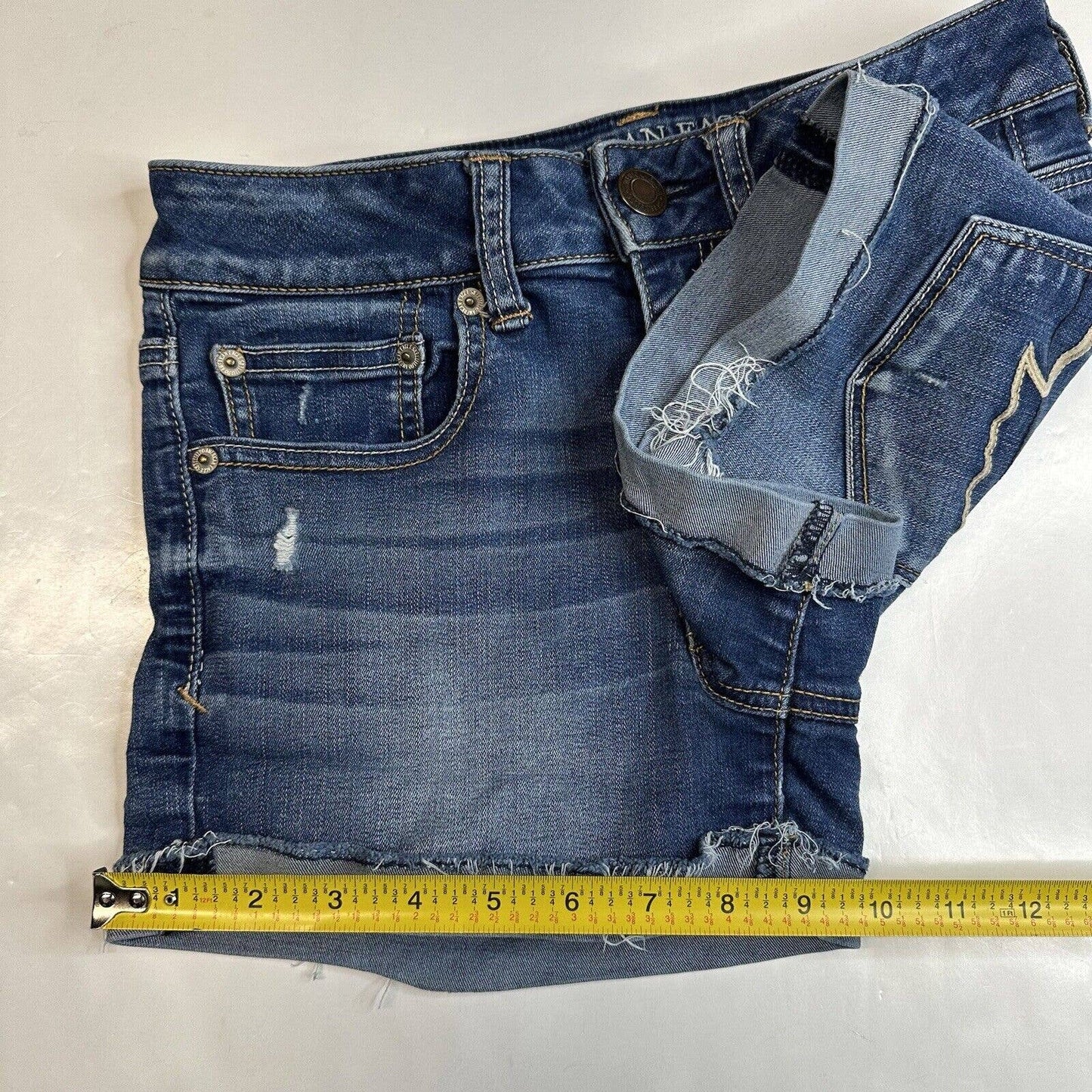 American Eagle Shortie 6 Super Stretch Denim Blue Jean Cuffed Shorts Distressed